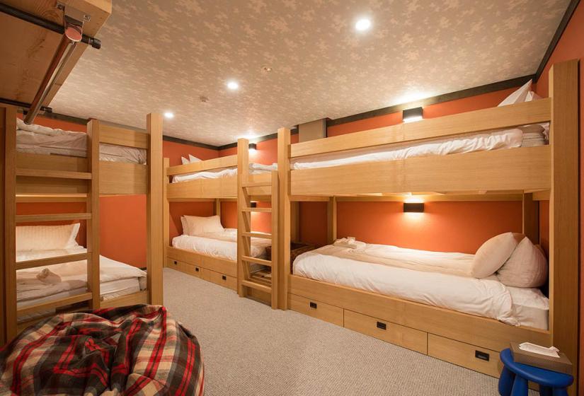 room with six bunk beds