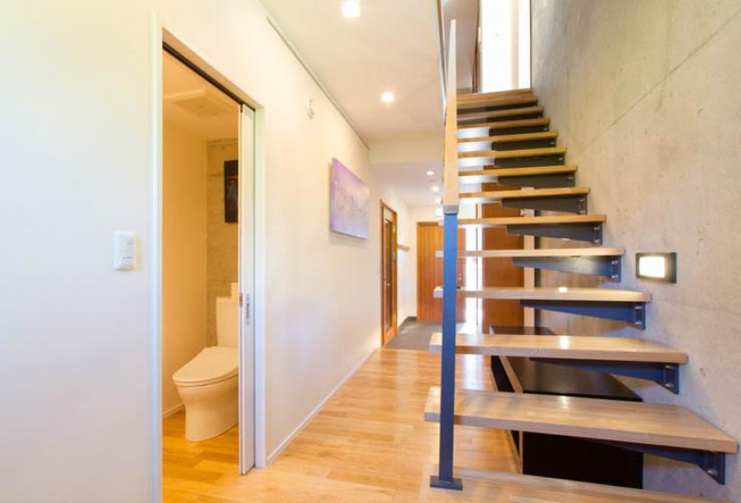 stairs to entrance hallway and toilet