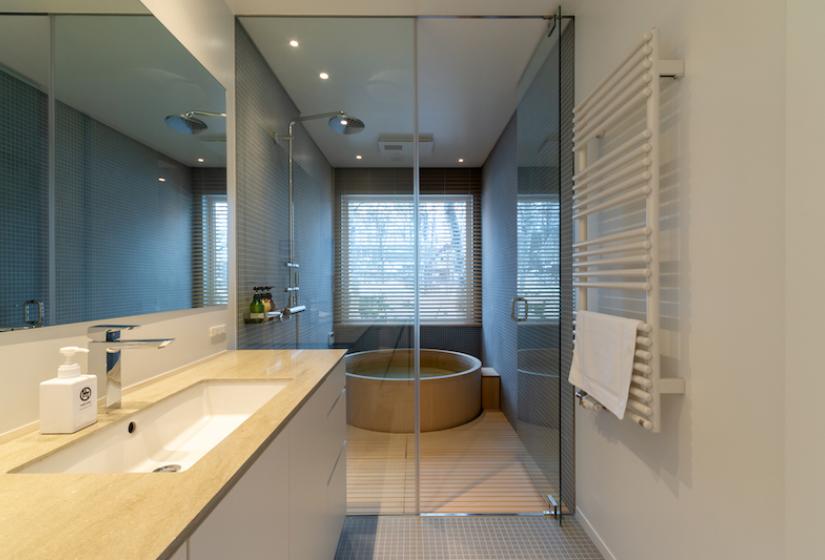 Bathroom sink and hinoki bath behind