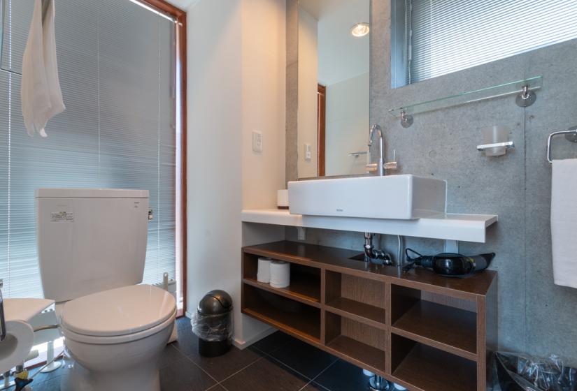 bathroom with sink and shelving