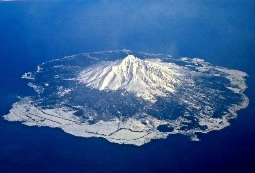 A snow covered Rishiri Island from the air