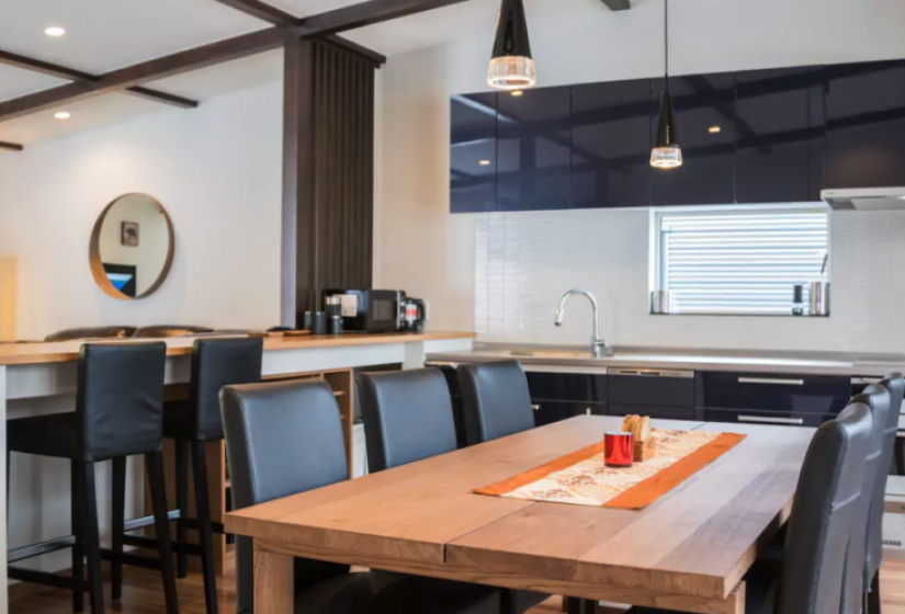 screen_shot_2018-03-08_at_15.16.06.png Wooden dining table with black chairs