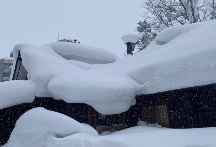 Snow covered roofs in Hirafu village