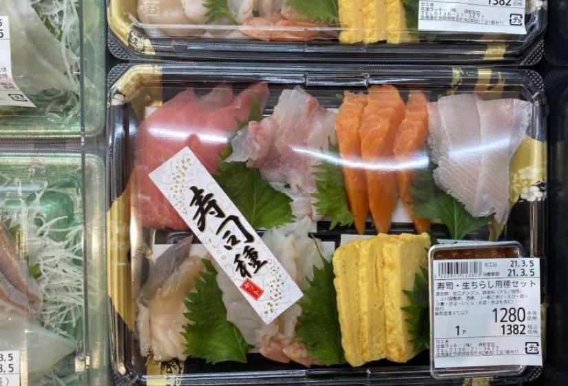 Sashimi A plastic box of various sashimi