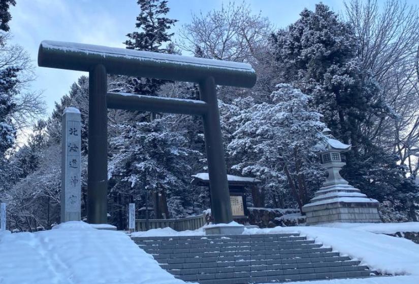 Large Japanese tori gates in a snowy back drop