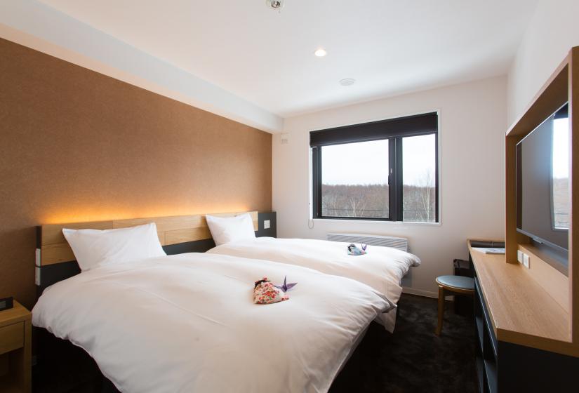 two white beds