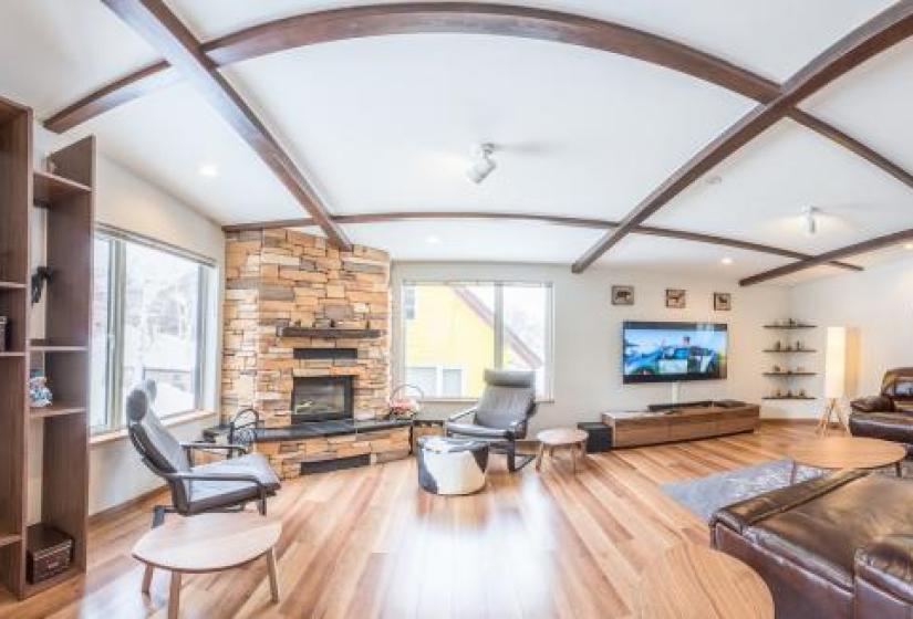 A large living area with wooden floors