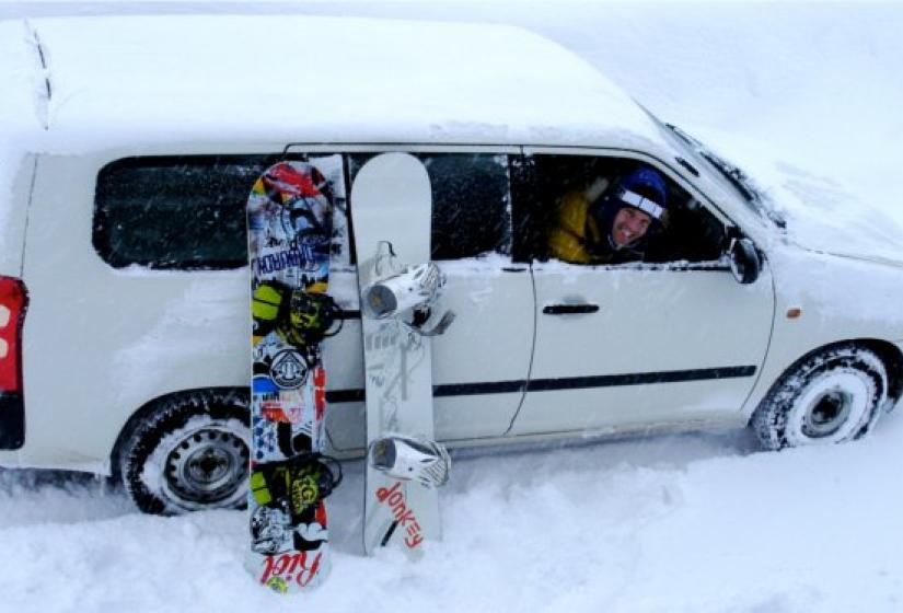 A Toyota Succeed in the snow.