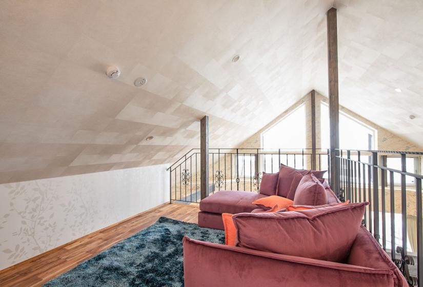 Pink sofa in loft