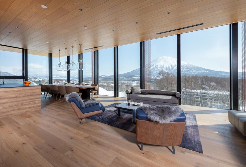 A lounge area with expansive mountain view