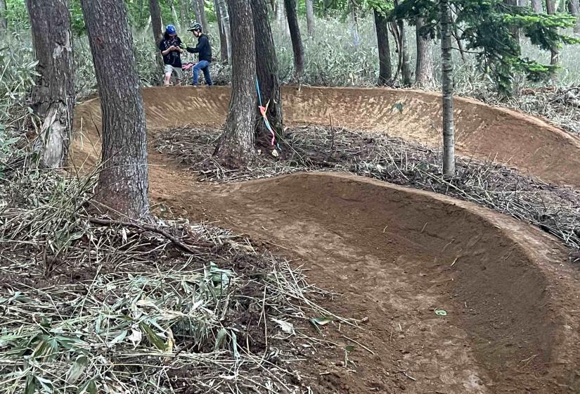 A banked mountain bike dirt chicane