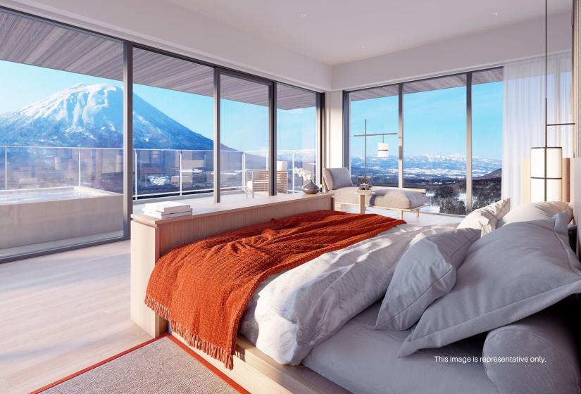 A computer generated image of a large bedroom with expansive views of Mount Yotei