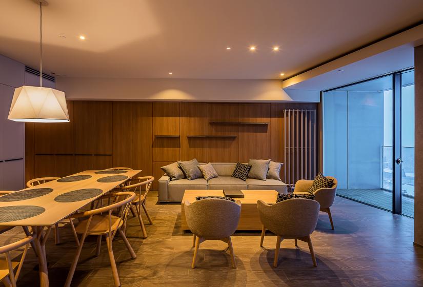 Lounge room with kitchen tables and lounge room