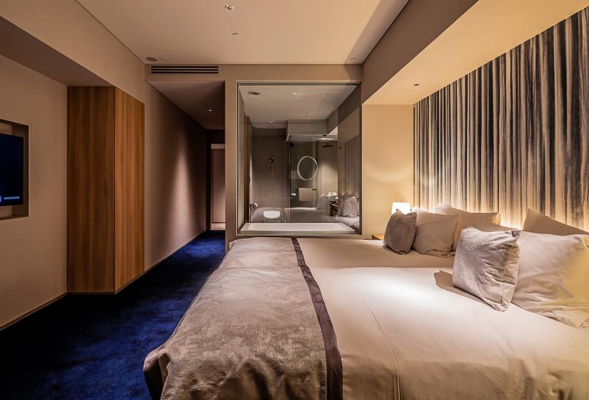 Bedroom with 2 x beds and shower