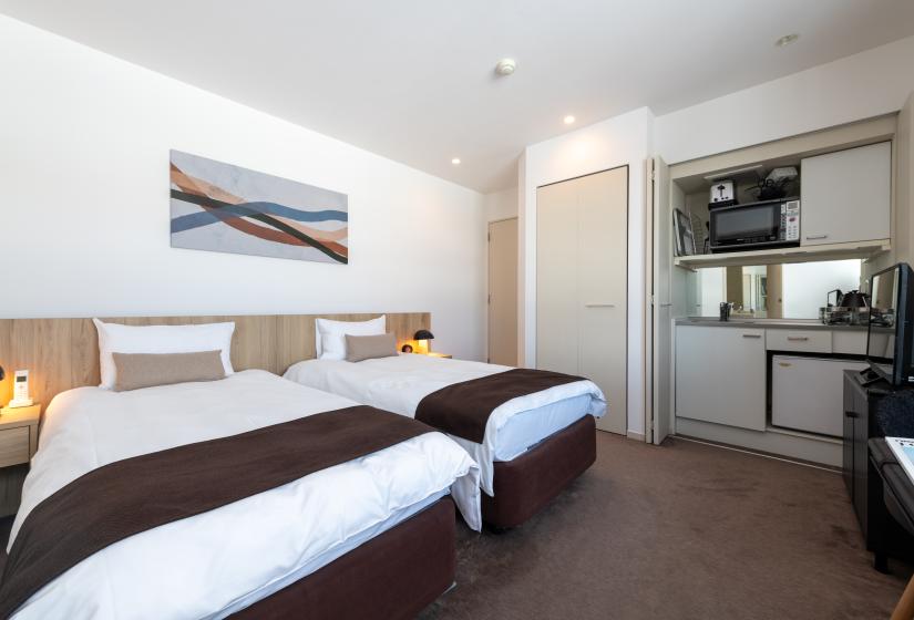 2 single beds with storage