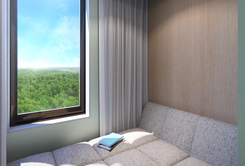 A day bed beside window