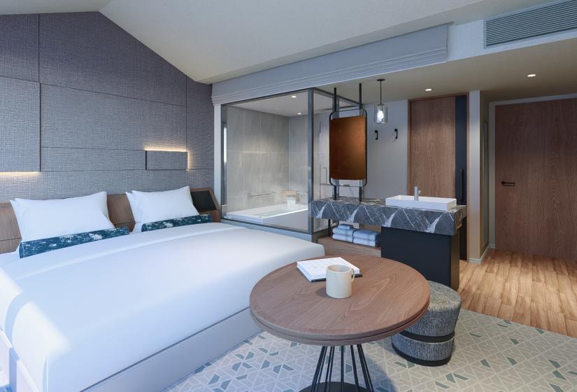 A double bed with table in front