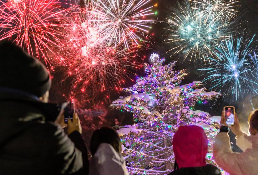 Fireworks at Hanazono behind their signature Christmas tree Fireworks behind a Christmas tree