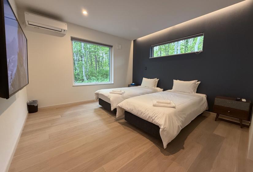 Two made up single beds