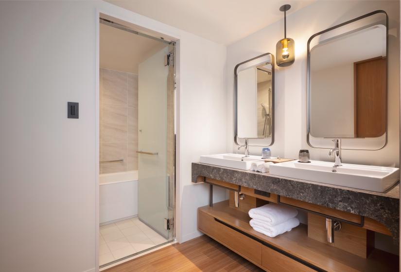 A bathroom with two sinks