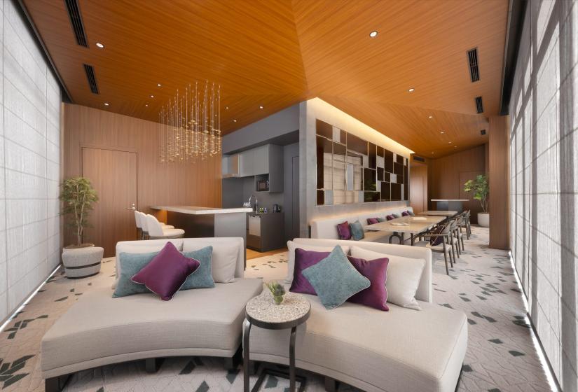 A curbed lounge suite with bar behind.